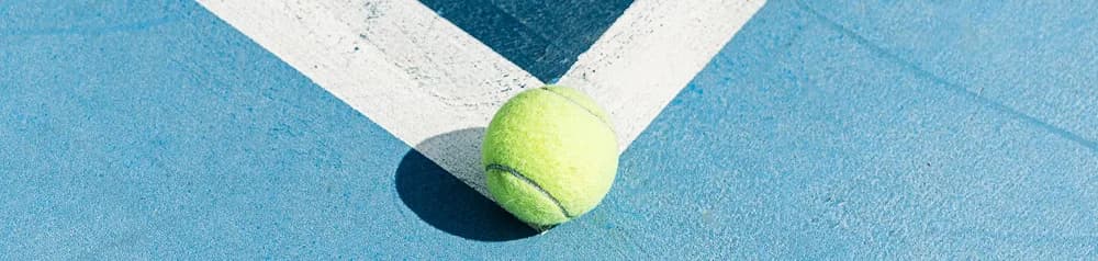 Ball at a tennis court corner